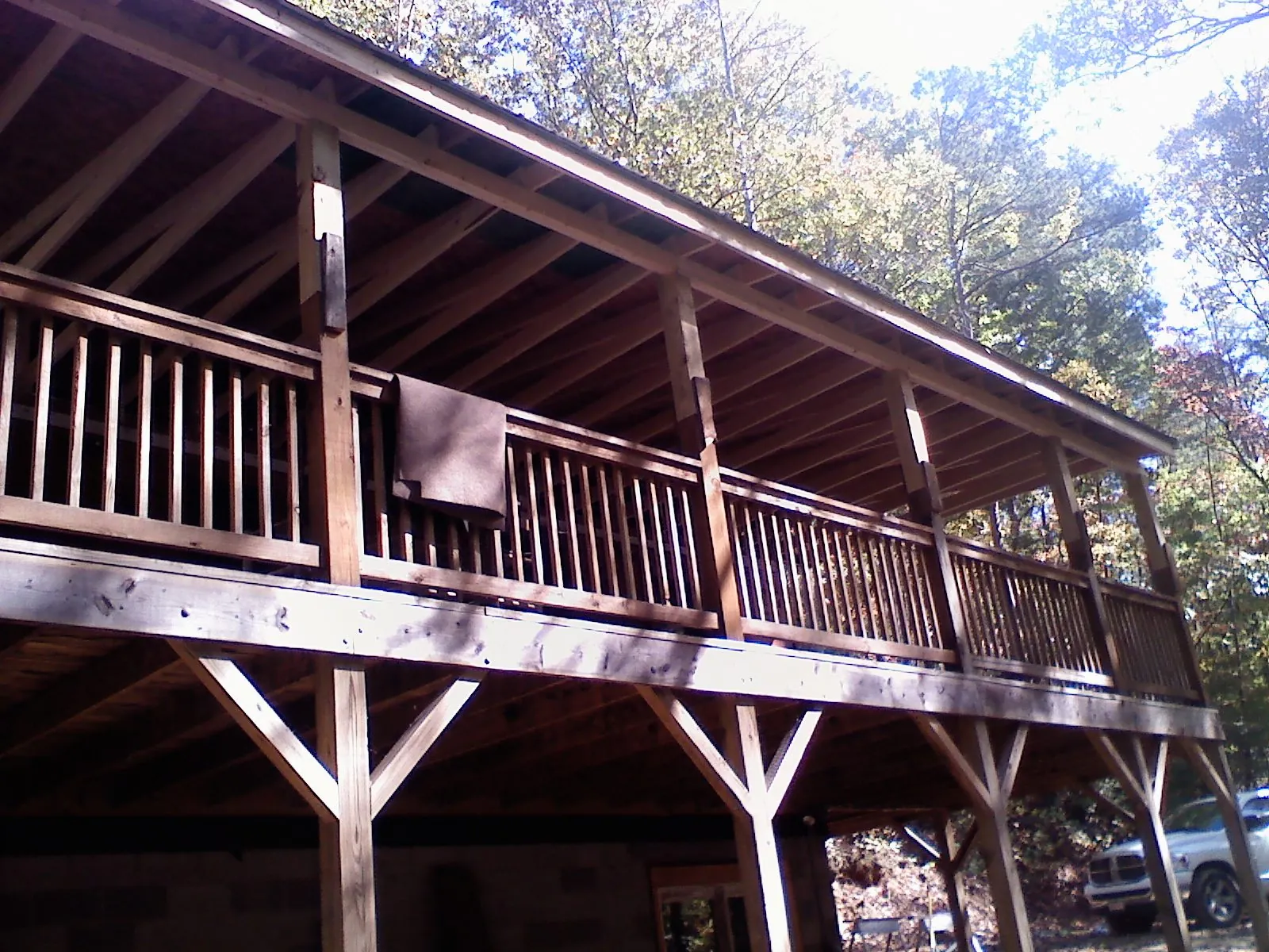 Timber framing under a new elevated porch and deck — Roof Leak Repair in Glenpool by Roofing Brothers